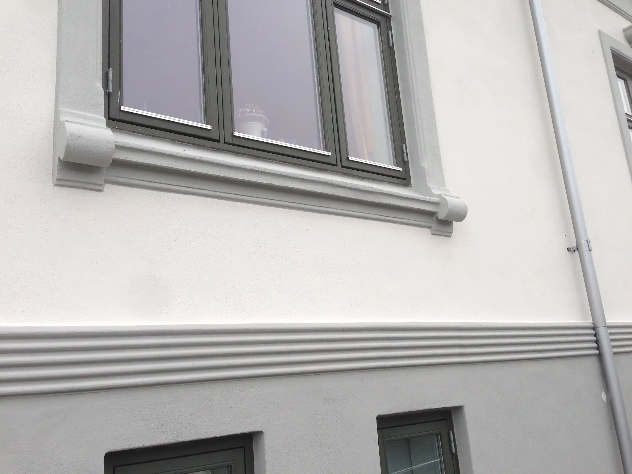Facaderenovering omkring vinduer